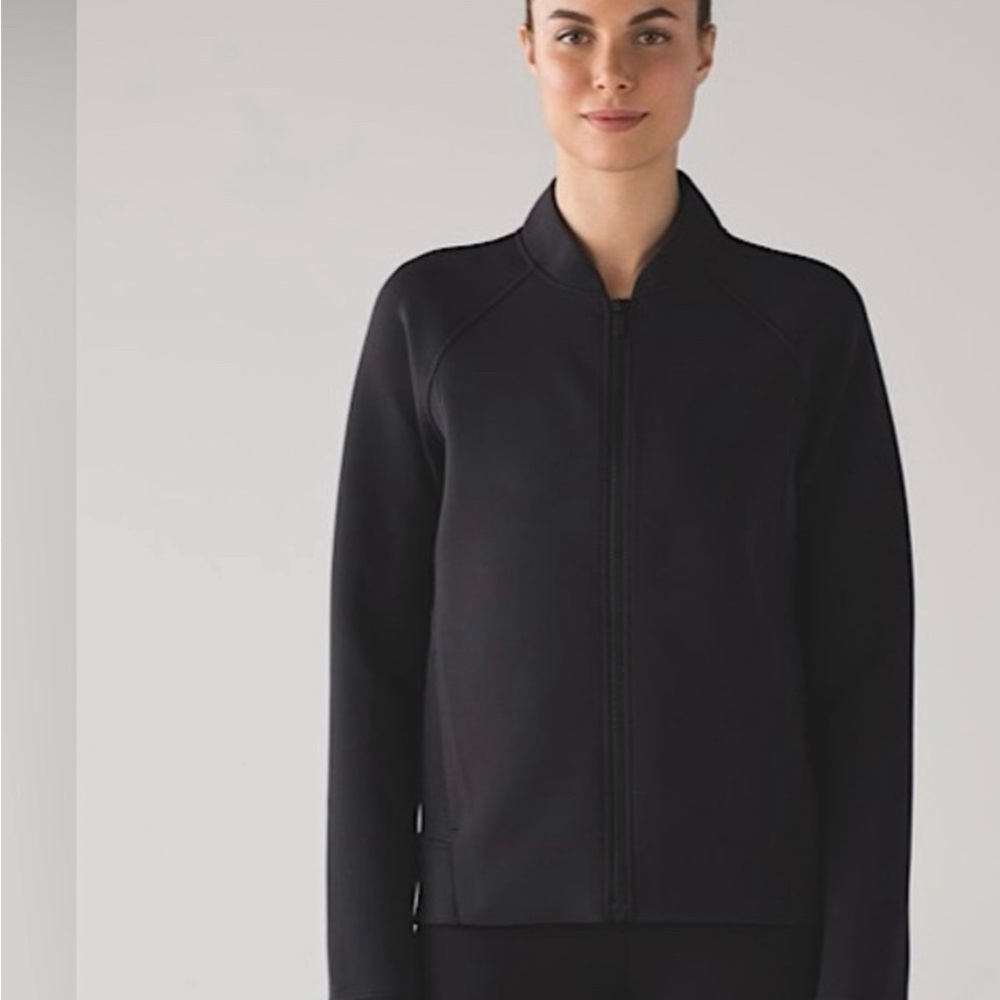 Lululemon embrace the space jacket. Never worn. Sz 8 stretch material no flaw